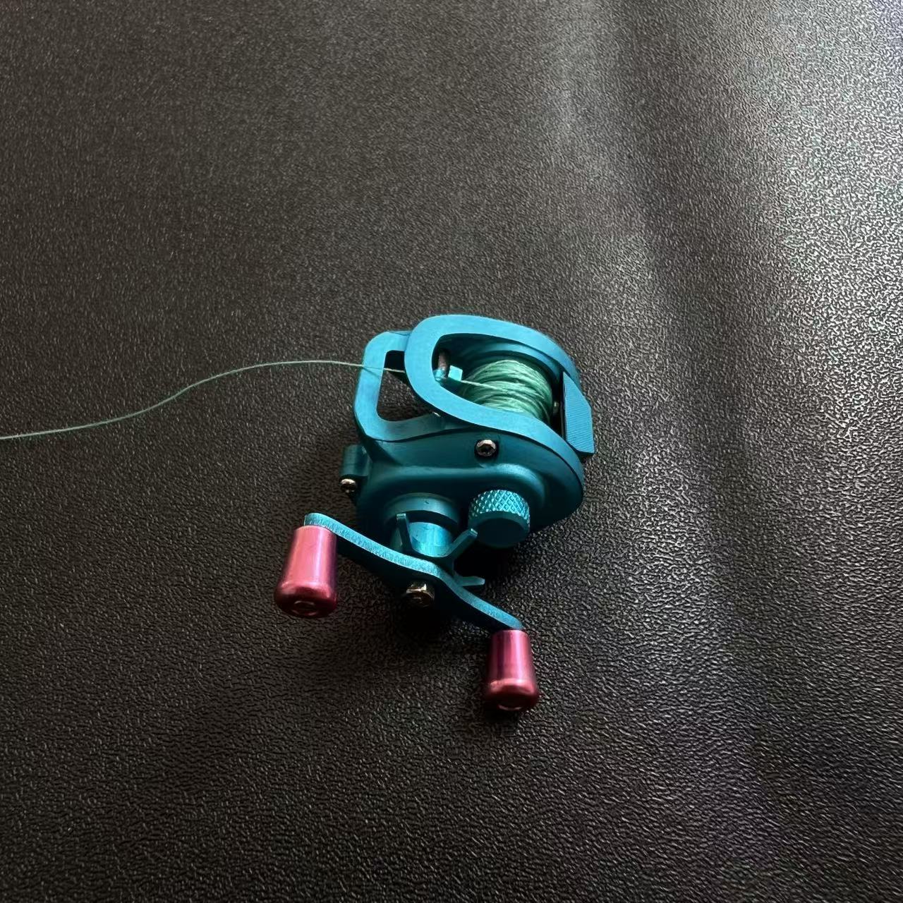 Mini Baitcasting Reel Necklace-Teal Blue 1.0